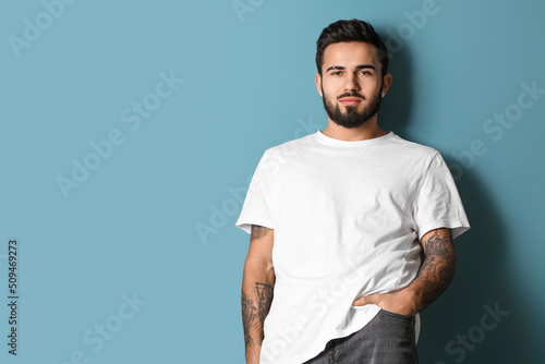 Fashionable bearded man pos...