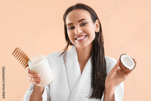Young woman with jar of coc...