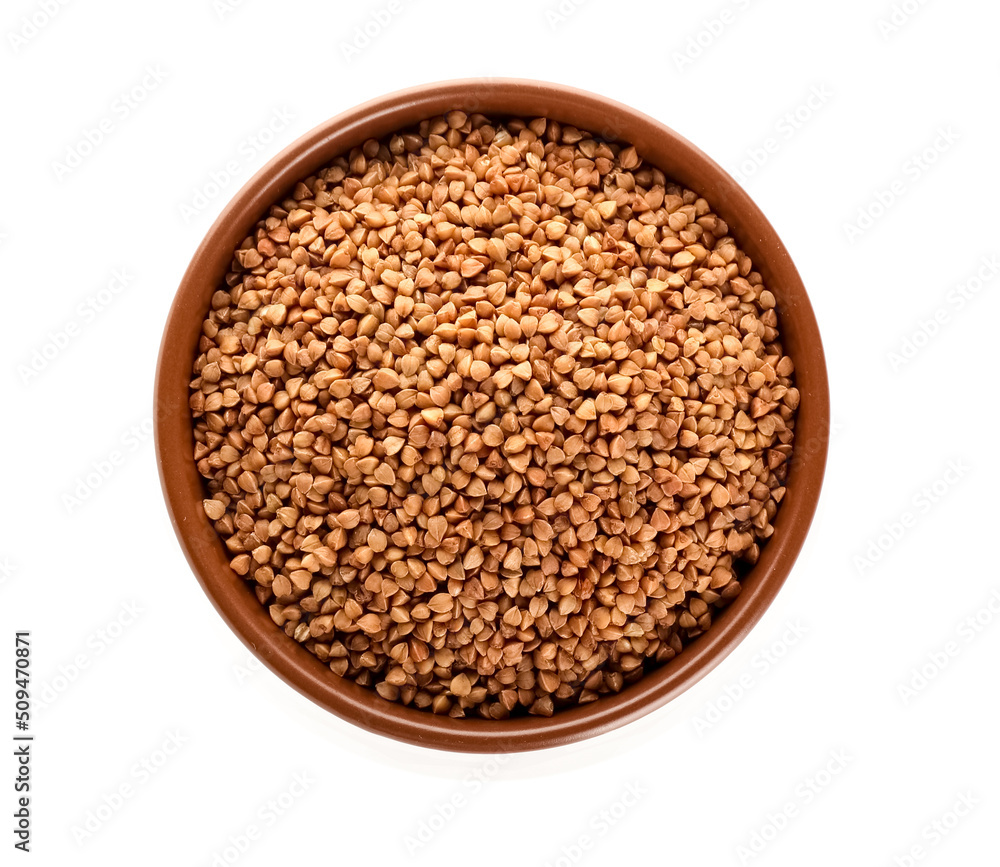 Bowl with buckwheat grains on white background Bowl with buckwheat grains on white background