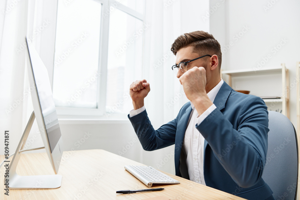handsome businessman computer desktop work self-confidence Gray background handsome businessman computer desktop work self-confidence Gray background