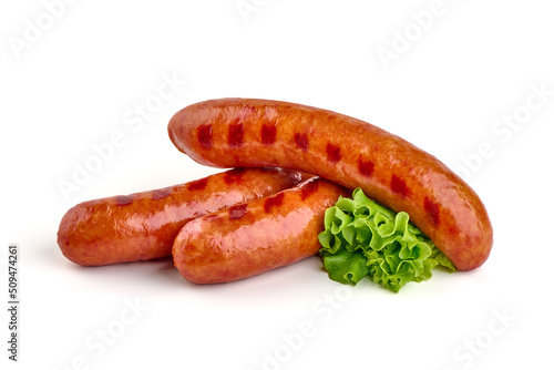 Grilled bratwurst sausages, isolated on white background.