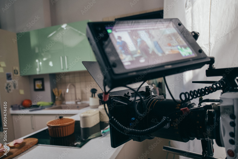 Professional film and video camera on the set. Shooting shift, equipment and group. Professional film and video camera on the set. Shooting shift, equipment and group.
