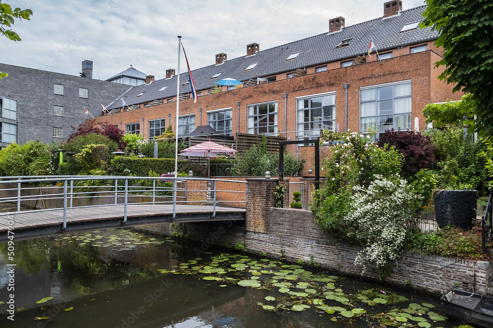 Picturesque embankment of the Canal in the Dutch City of Amersfoort. Amersfoort is a beautiful city in the Utrecht province of the Netherlands.