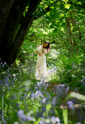 Wallpaper Mural Indian Girl in a white dress walking through a Blue Bell Wood Torontodigital.ca