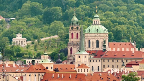 Wallpaper Mural St. Nicholas Church in Prague's Lesser Town, an Artistically Significant and Unique Baroque Building Surrounded by Trees and Greenery in the Heart of Europe, Czech Republic Torontodigital.ca