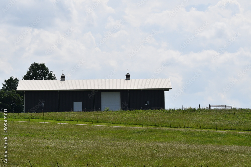 Metal Barn in a Field Metal Barn in a Field