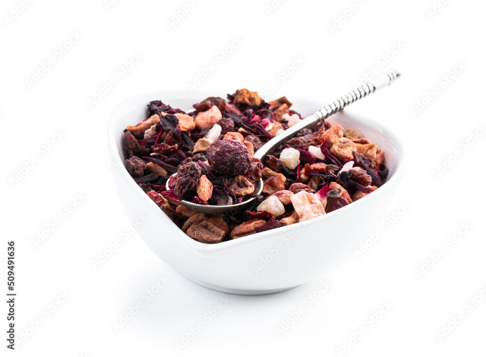 Obraz premium Dry fresh fruit tea in small ceramic bowl isolated on white