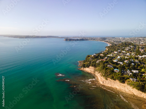 Aerial shots of beachfront property in Red Beach  New Zealand
