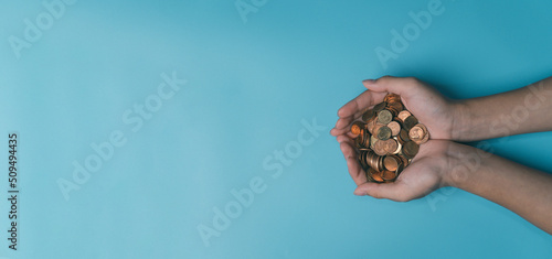 child hands holding Australian money, donate concept
