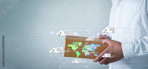 Businessman holding a box of goods. Online shopping concept, world of internet selling for online business, ecommerce, internet banking, global shipping.