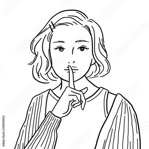 口に指を当て内緒ポーズをする女性