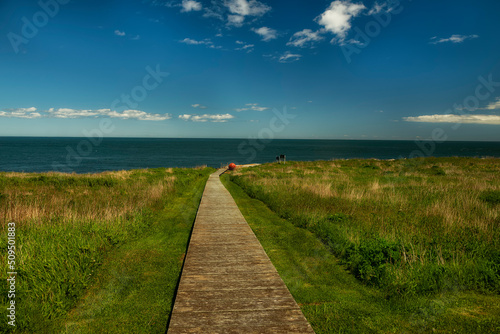 Wooden path to the island overlooking the ocean. Atlantic Ocean. USA. Canada. Maine. © Ann Stryzhekin