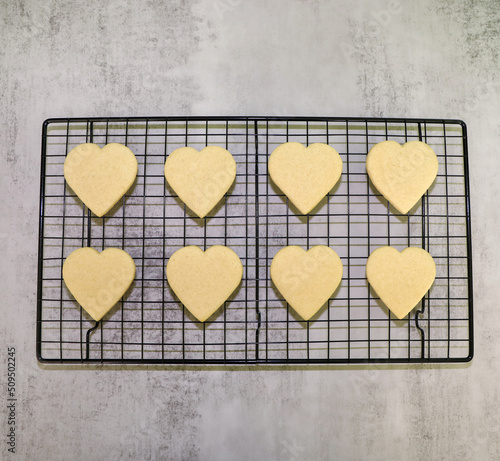 Heart shaped sugar cookies to be decorated with royal icing for valentine's day. photo