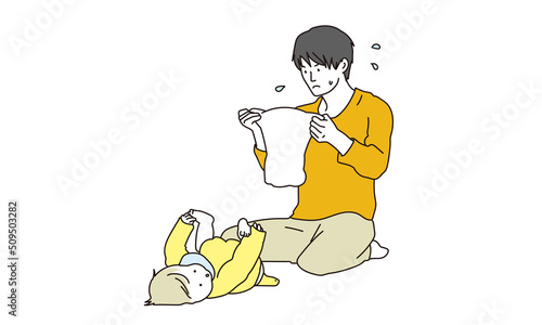 赤ちゃんのおむつ交換をする男性