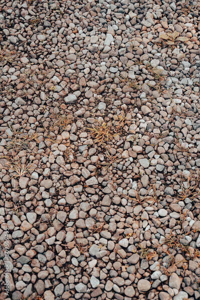 A photograph filled with pebbles and stones. A photograph filled with pebbles and stones.
