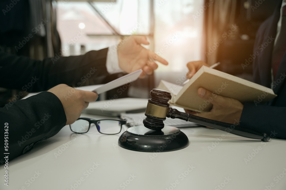 Judge gavel with Justice lawyers having team Concepts of Law and Legal services