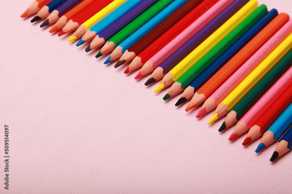close up photo of a collection of colourful wooden pencil, art supplies. isolated on studio background with copy space. close up photo of a collection of colourful wooden pencil, art supplies. isolated on studio background with copy space.