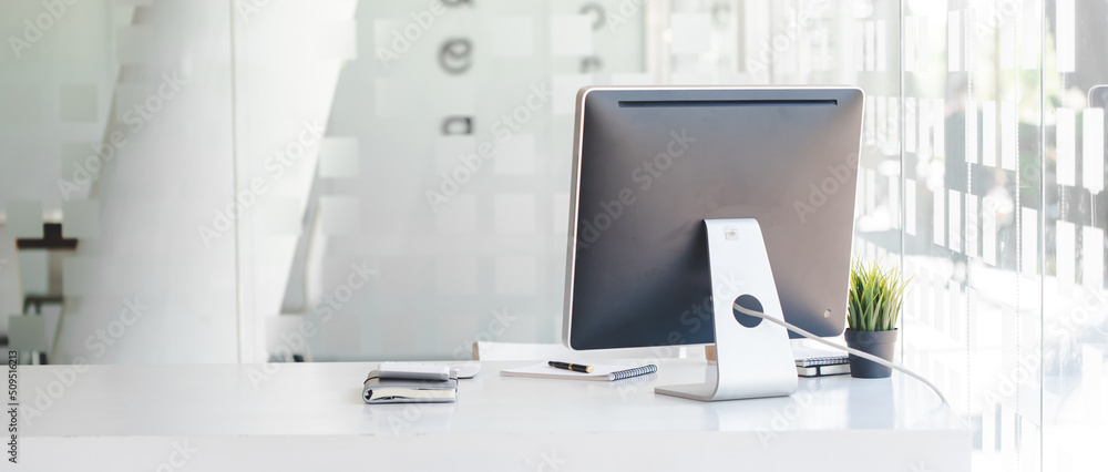 Stylish workspace with desktop computer work desk concept Stylish workspace with desktop computer work desk concept