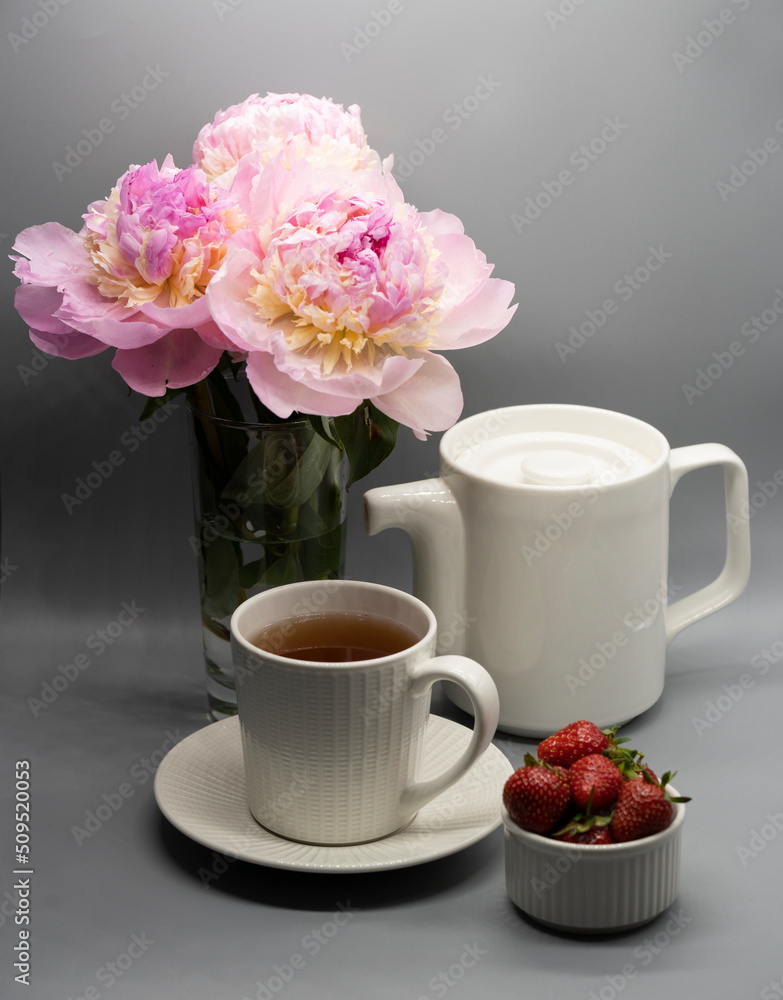 Сup of tea, peony and berries. Сup of tea, peony and berries.