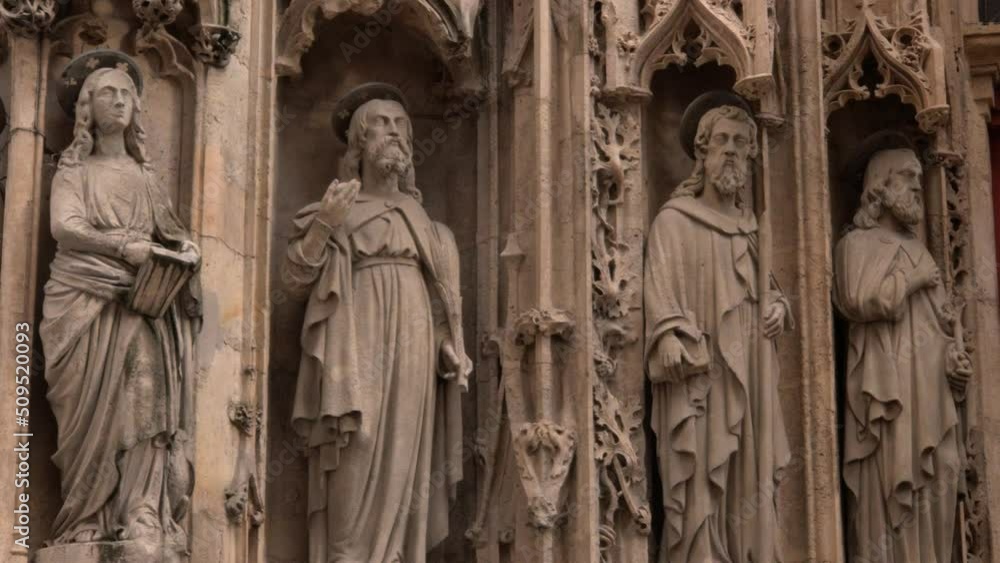 close shot of the sculpture details of saints statues close shot of the sculpture details of saints statues