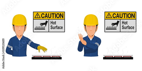 A worker with hot surface warning sign