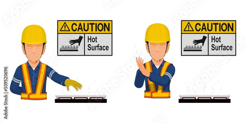 A worker with hot surface warning sign