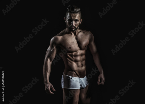 Sexy male model body, nude torso. Sexy naked man, seductive gay.