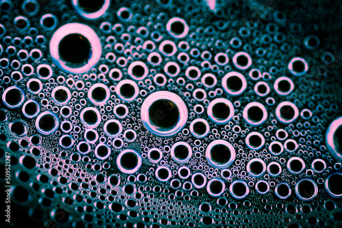 Background for desktop, website, or poster. Perfect circles of bubbles. Tiny and perfect.  Evaporation. photo