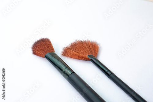 two makeup brushes isolated on a white background