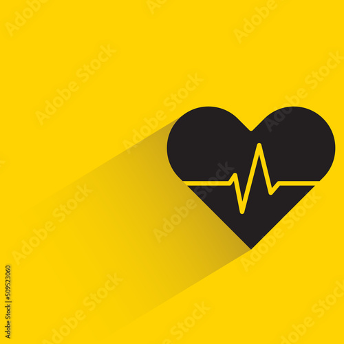 heartbeat with shadow on yellow background