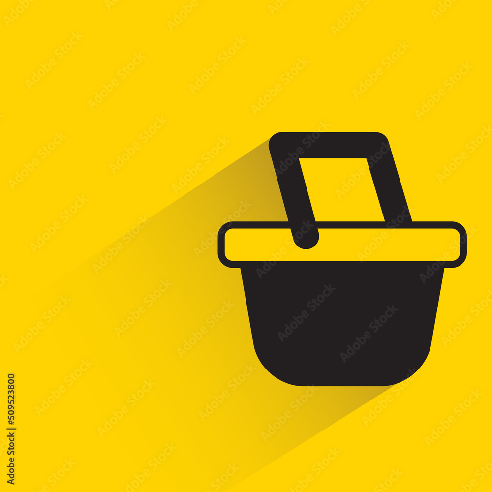 grocery basket icon with shadow on yellow background