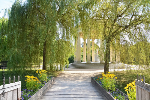 Title: The Marlborough Tower and pond in the Queen s Hamlet at Marie-Antoinette s Estate near Versailles Palace. photo