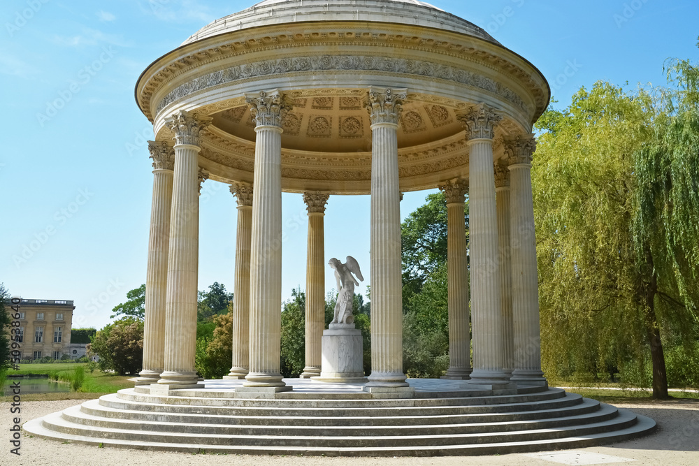 Title: The Marlborough Tower and pond in the Queen s Hamlet at Marie-Antoinette s Estate near Versailles Palace.