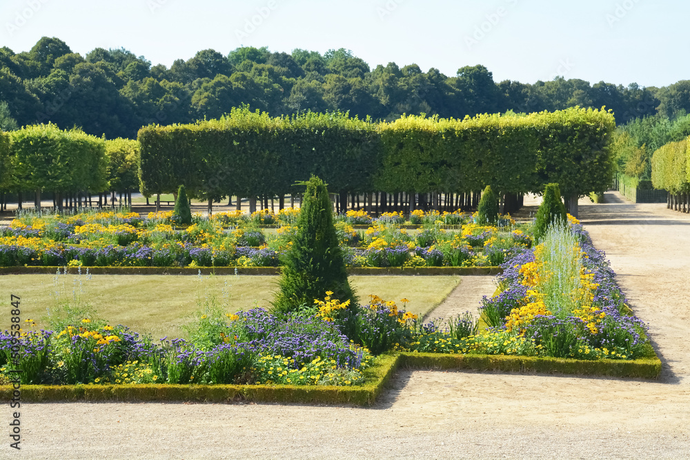 Obraz premium Title: The Marlborough Tower and pond in the Queen s Hamlet at Marie-Antoinette s Estate near Versailles Palace.