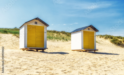 Lonely colorful beach lockers on a Dutch beach © atosan
