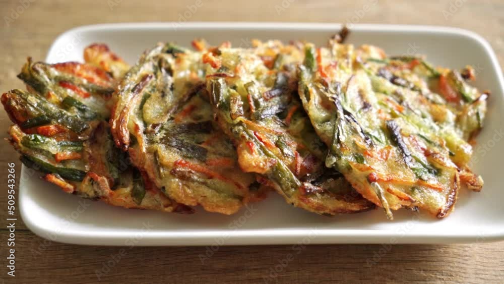 Pajeon or Korean pancake or Korean pizza - Korean traditional food style Pajeon or Korean pancake or Korean pizza - Korean traditional food style