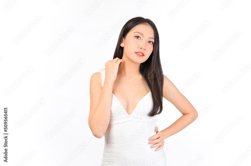 Portrait of young beautiful sexy asian woman wearing a white dress pose with empty space. Portrait of young beautiful sexy asian woman wearing a white dress pose with empty space.