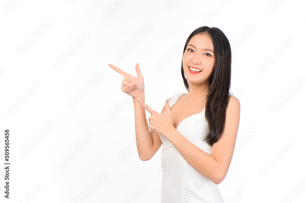 Portrait of young beautiful sexy asian woman wearing a white dress pose with empty space. Portrait of young beautiful sexy asian woman wearing a white dress pose with empty space.