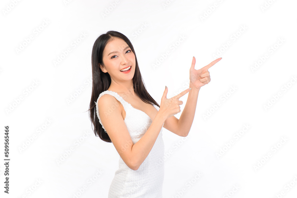 Portrait of young beautiful sexy asian woman wearing a white dress pose with empty space. Portrait of young beautiful sexy asian woman wearing a white dress pose with empty space.