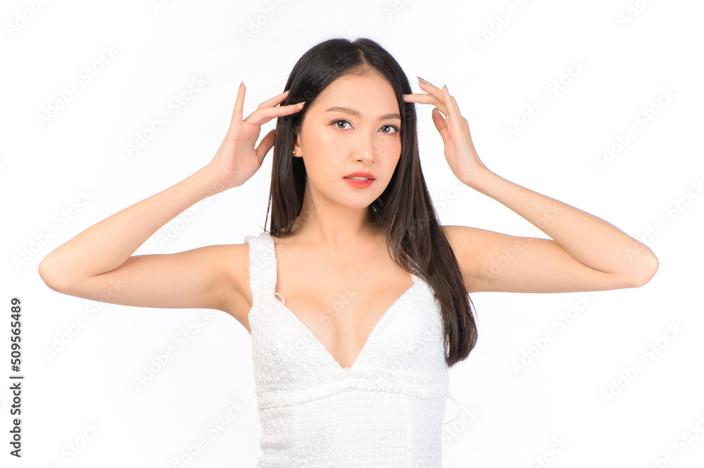 Portrait of young beautiful sexy asian woman wearing a white dress pose with empty space. Portrait of young beautiful sexy asian woman wearing a white dress pose with empty space.
