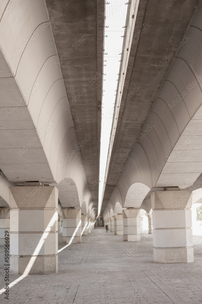 concrete corridor under the bridge, architecture perspective in neutral colours