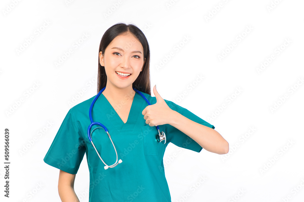 Portrait of professional confident young asian female smiling doctor in green scrubs hands pointing showing thumbs up, presenting with copy space, doctor healthcare and doctors concept. Portrait of professional confident young asian female smiling doctor in green scrubs hands pointing showing thumbs up, presenting with copy space, doctor healthcare and doctors concept.