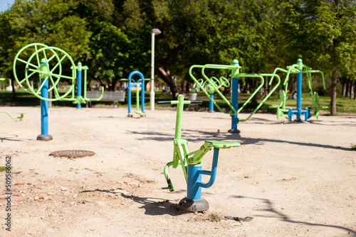Sports playground in the park for making gymnastics exercises on open air. Open air gym in public park in Spain