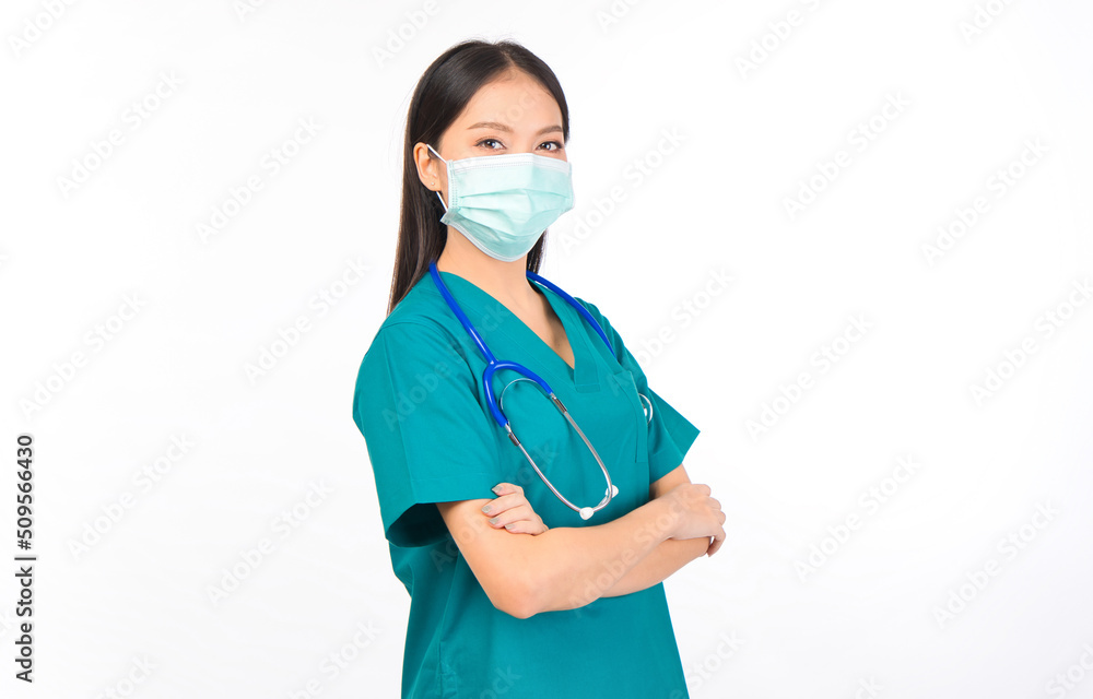 Portrait of professional confident young asian female smiling doctor in green scrubs doctor healthcare and doctors concept. Portrait of professional confident young asian female smiling doctor in green scrubs doctor healthcare and doctors concept.