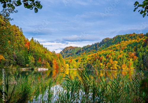 Fototapeta Naklejka Na Ścianę i Meble -  Autumn lake with clouds and forest