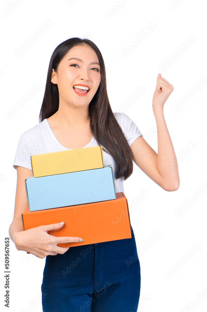 Happy cute asian woman smiling and holding package online marketing and delivery Start a small business at home on white background, Delivery shipping service concept. Happy cute asian woman smiling and holding package online marketing and delivery Start a small business at home on white background, Delivery shipping service concept.