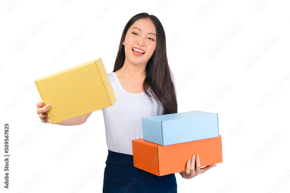 Happy cute asian woman smiling and holding package online marketing and delivery Start a small business at home on white background, Delivery shipping service concept. Happy cute asian woman smiling and holding package online marketing and delivery Start a small business at home on white background, Delivery shipping service concept.