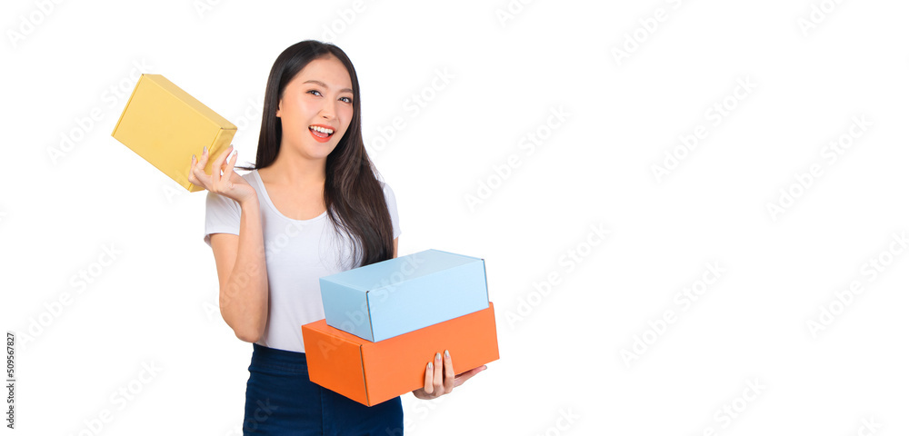 Happy cute asian woman smiling and holding package online marketing and delivery Start a small business at home on white background, Delivery shipping service concept. Happy cute asian woman smiling and holding package online marketing and delivery Start a small business at home on white background, Delivery shipping service concept.