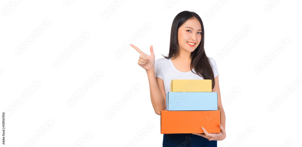 Happy cute asian woman smiling and holding package online marketing and delivery Start a small business at home on white background, Delivery shipping service concept. Happy cute asian woman smiling and holding package online marketing and delivery Start a small business at home on white background, Delivery shipping service concept.
