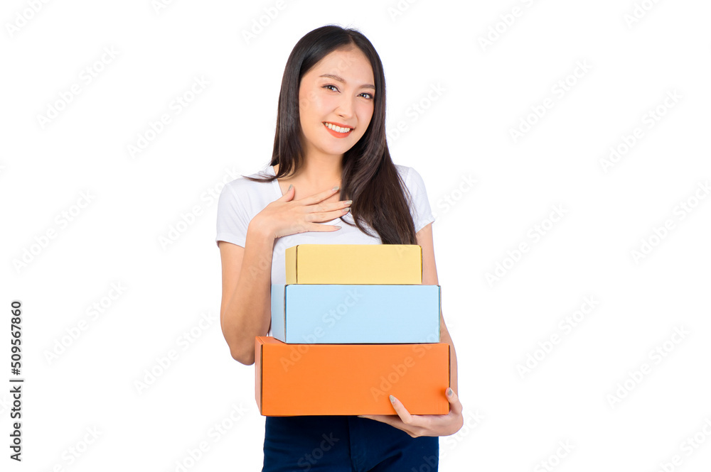 Happy cute asian woman smiling and holding package online marketing and delivery Start a small business at home on white background, Delivery shipping service concept. Happy cute asian woman smiling and holding package online marketing and delivery Start a small business at home on white background, Delivery shipping service concept.